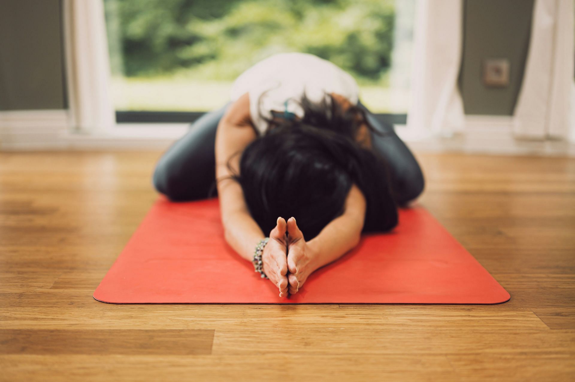 Child's pose (Image by Conscious Design/Unsplash)